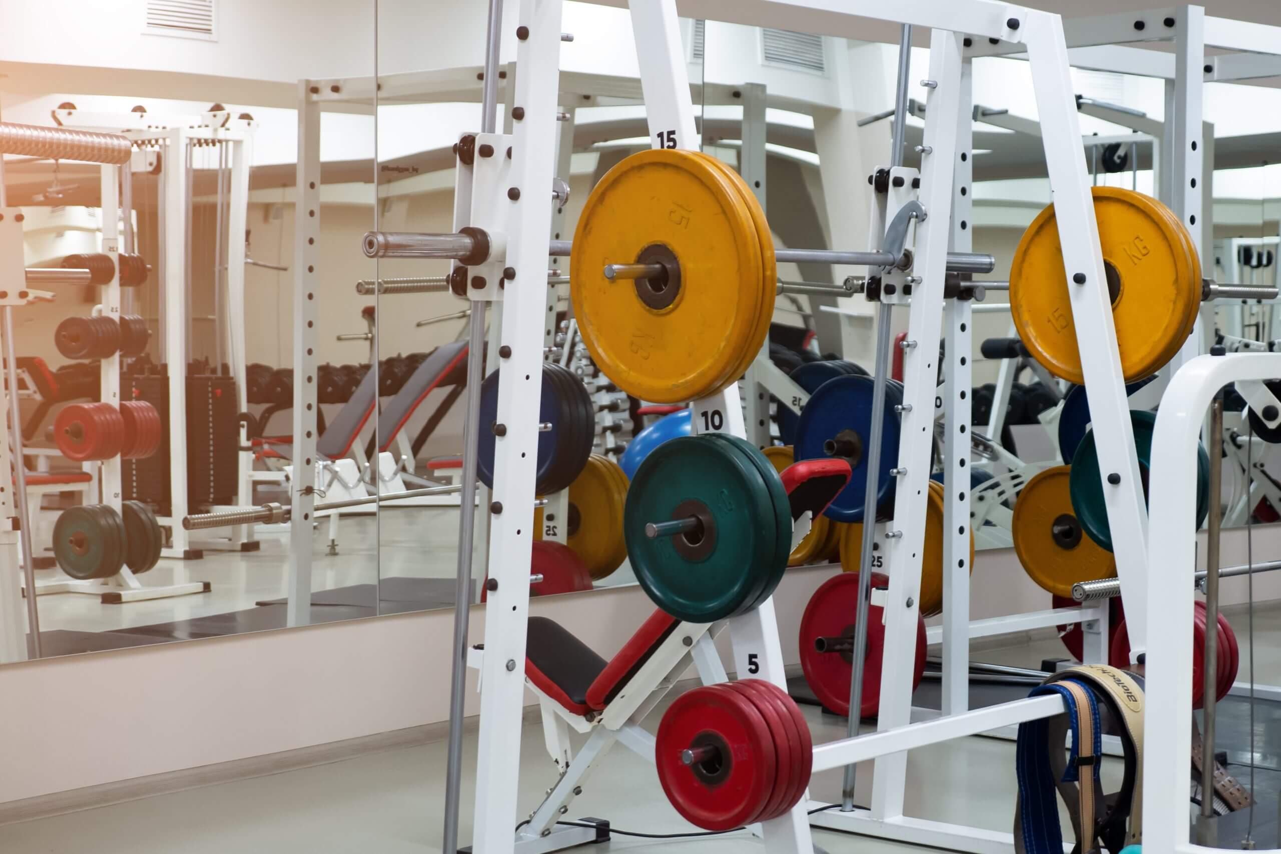 gym modern fitness center room. empty hall with simulators on different muscles.